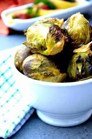 Honey-Roasted Brussels Sprouts with Cinnamon Almond Sauce (Gluten-Free) - The finished honey-roasted Brussels sprouts.