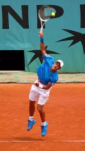 Photo of Novak Djokovic serving at the French Open: CC-y.caradec Photo of Novak Djokovic serving at the French Open: CC-y.caradec