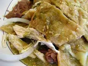 In this photo, chilaquiles verde includes chicken. Photo: CC--sheriw