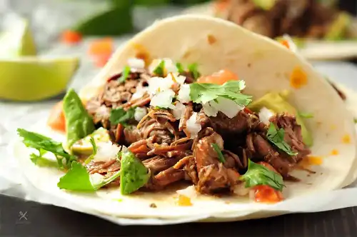 Gluten-Free Beef Barbacoa in the Slow Cooker - Slow Cooker Beef Barbacoa (32130811495) by Sharon Chen from Austin, United States is licensed under CC BY 2.0.