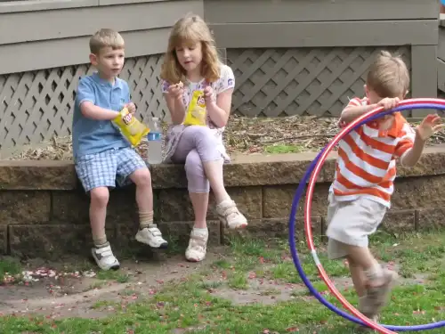 Study on Celiac Disease Prevalence in Children with Chronic Diarrhea (+Video) - Kids eating by Clarkston SCAMP is licensed under CC BY 2.0.++ Watch the Video ++