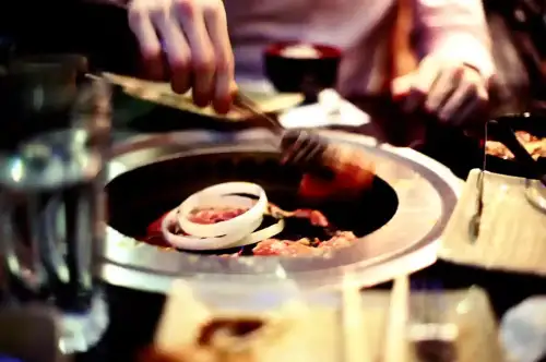 Traveling to Korea with Celiac Disease: A Gluten-Free Guide - Korean BBQ by flossyflotsam is licensed under CC BY 2.0.