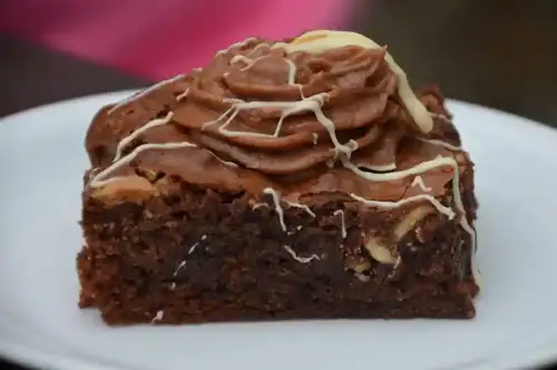 Tahini Swirl Fudgy Brownies (Gluten-Free) - Close up photo of a delicious chocolate brownie dessert by britishhamper is licensed under CC BY 2.0.