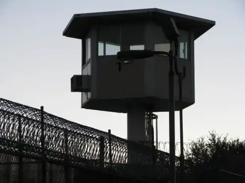 Inmate with Celiac Disease Wins $630,000 After Jail Denies Gluten-Free Food - prison guard tower by Rennett Stowe is licensed under CC BY 2.0.